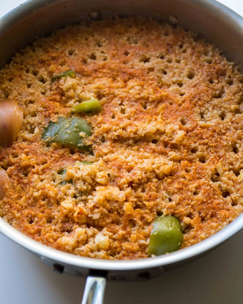 Swap out grains for Spanish cauliflower rice, a twist on the traditional side dish. This red cauliflower Spanish rice is a delicious way to eat more vegetables.